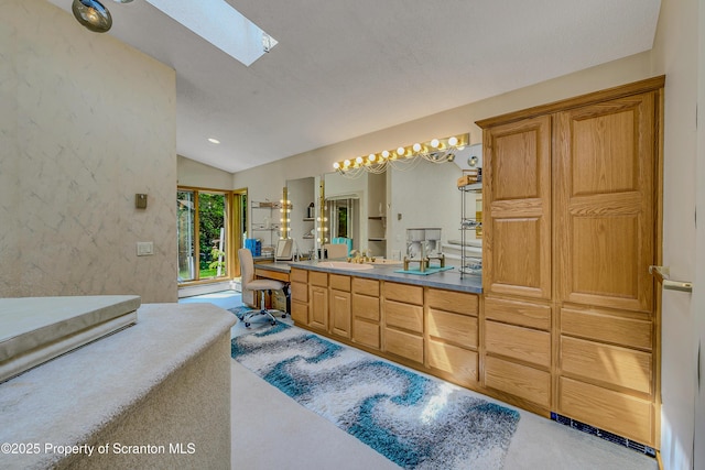 1742 State Route 848, New Milford, PA 18834 - bathroom with vaulted ceiling, a skylight, and vanity