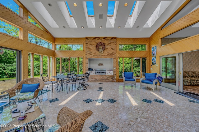 1742 State Route 848, New Milford, PA 18834 - sunroom with a skylight, high vaulted ceiling, wooden walls, and recessed lighting