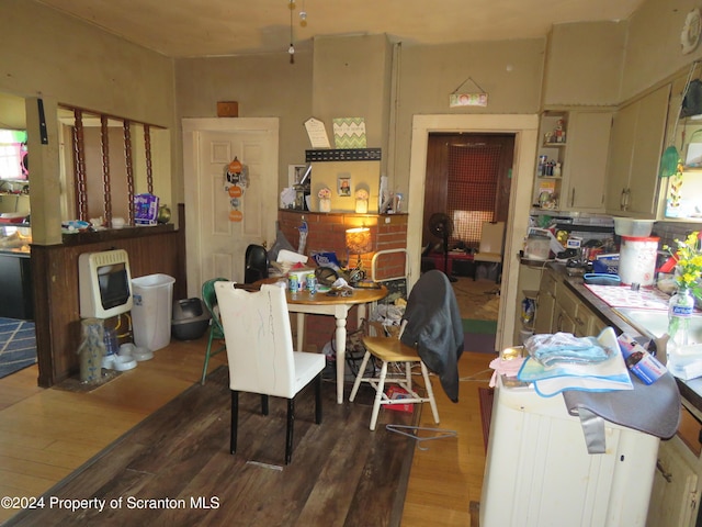 dining area with hardwood / wood-style flooring