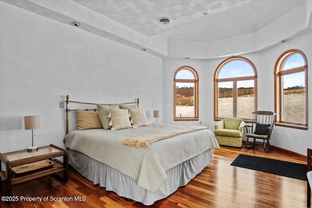 bedroom featuring wood-type flooring