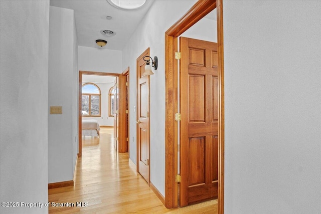 hall featuring light hardwood / wood-style floors