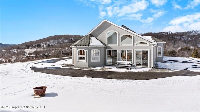 exterior space featuring a mountain view