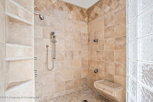 bathroom featuring tiled shower