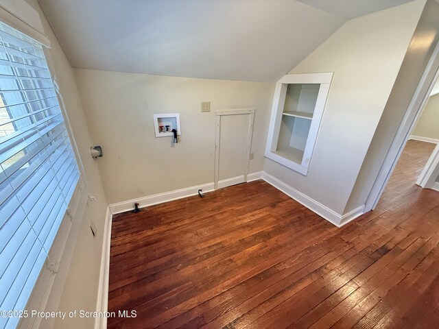 kitchen with radiator, tasteful backsplash, light hardwood / wood-style floors, sink, and stainless steel dishwasher