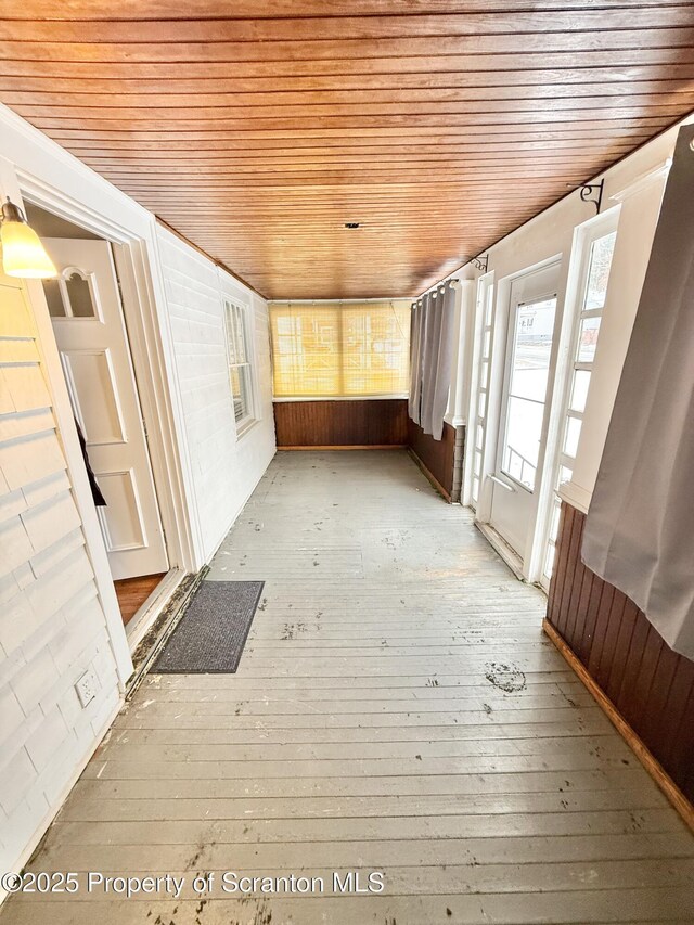 utility room with gas water heater