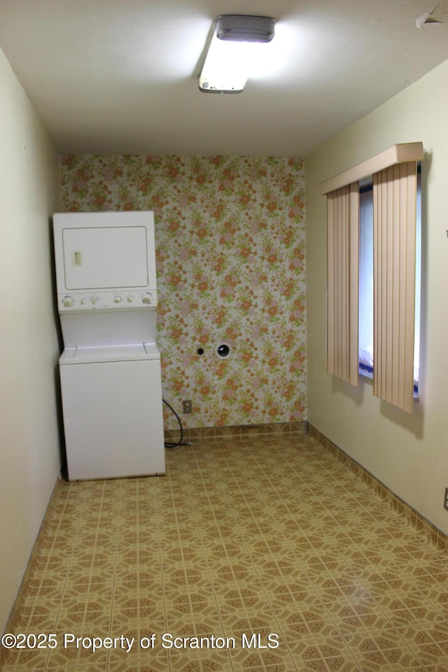 205 Orchard St, Old Forge, PA 18518 - washroom with stacked washer / drying machine, wallpapered walls, and light flooring