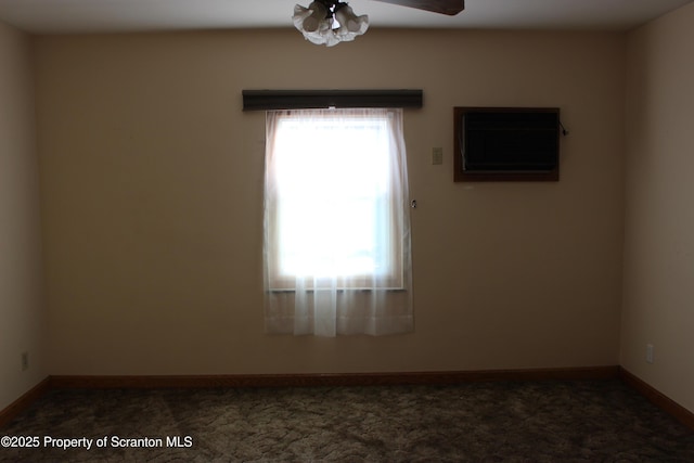 205 Orchard St, Old Forge, PA 18518 - unfurnished room with a ceiling fan and a wall mounted AC