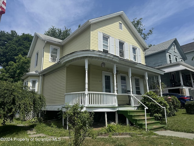 view of front of home with covered porch