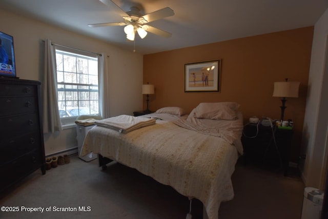 carpeted bedroom featuring ceiling fan