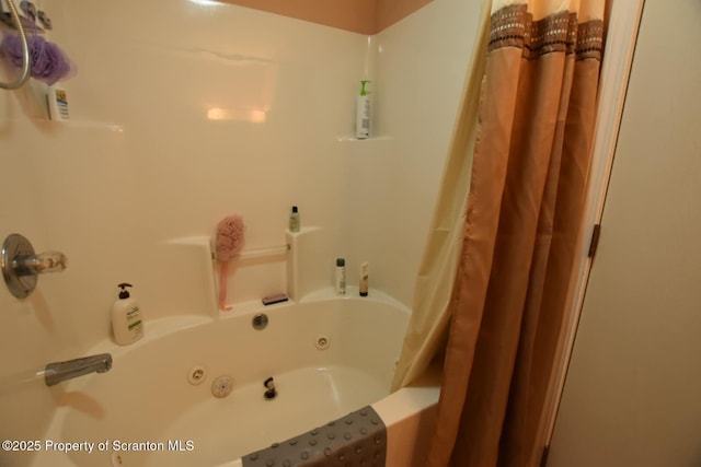 full bathroom featuring a combined bath / shower with jetted tub