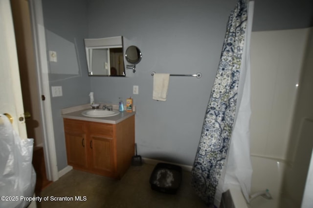 bathroom featuring shower / bath combination with curtain and vanity