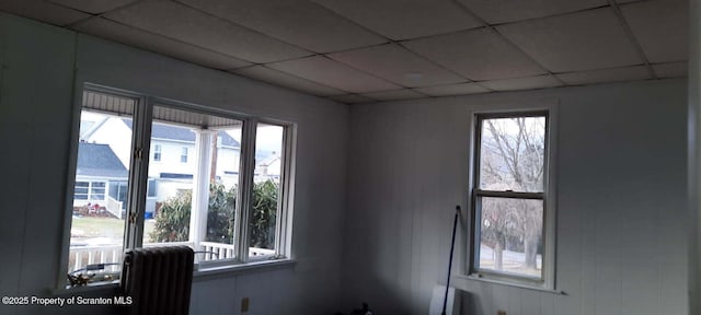 empty room with a drop ceiling