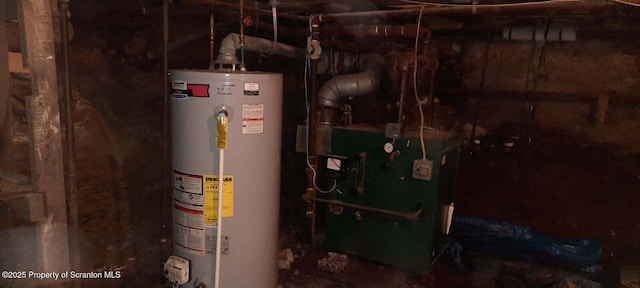 utility room featuring water heater