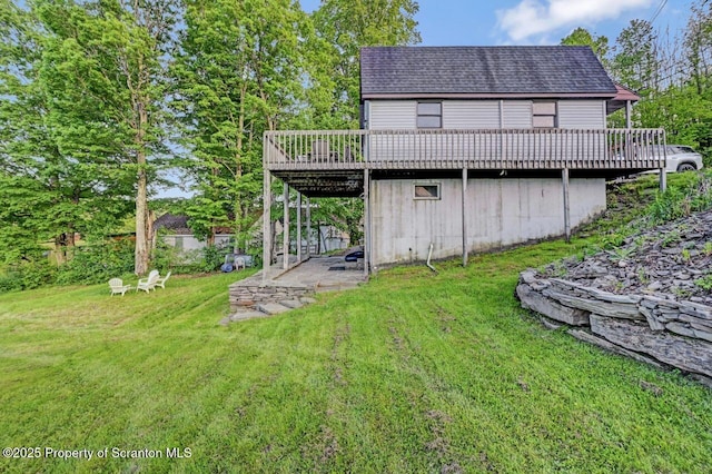 482 Lakeview Dr, Kingsley, PA 18826 - back of property featuring a wooden deck, a yard, and a shingled roof
