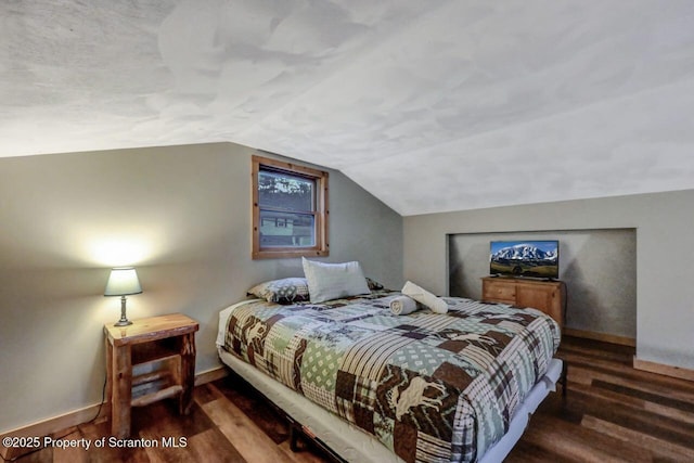 482 Lakeview Dr, Kingsley, PA 18826 - bedroom featuring wood finished floors, vaulted ceiling, and baseboards
