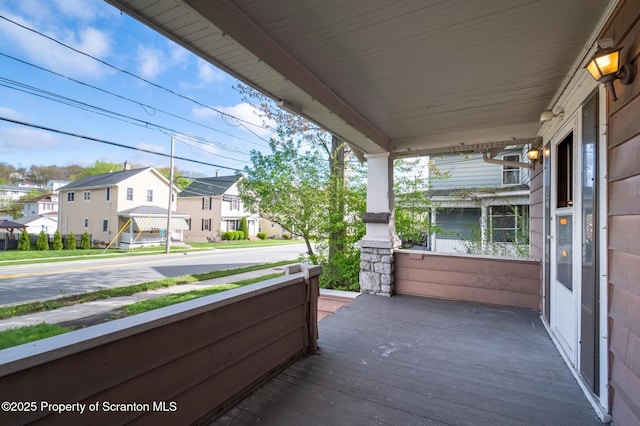 view of patio featuring a residential view and covered porch
