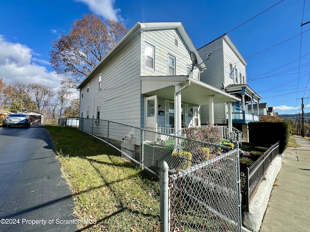 546 Emmett St, Scranton, PA 18505 - view of home's exterior with a porch and a fenced front yard