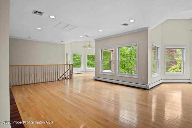 441 Hidden Lake Dr, East Stroudsburg, PA 18302 - empty room with ornamental molding, wood finished floors, recessed lighting, and a baseboard heating unit