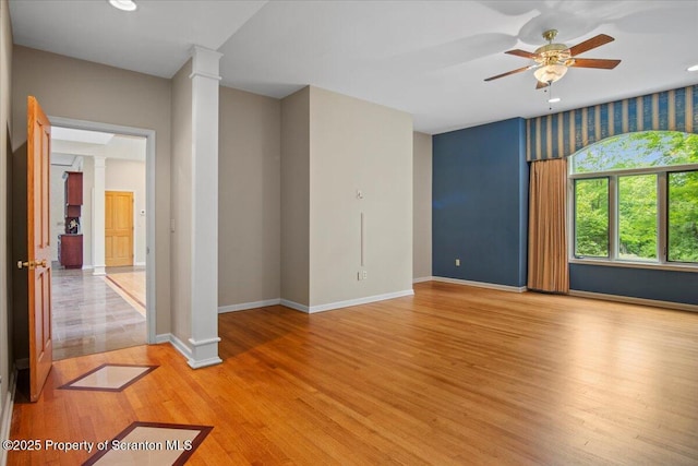 441 Hidden Lake Dr, East Stroudsburg, PA 18302 - unfurnished room featuring ornate columns, a ceiling fan, light wood finished floors, and recessed lighting