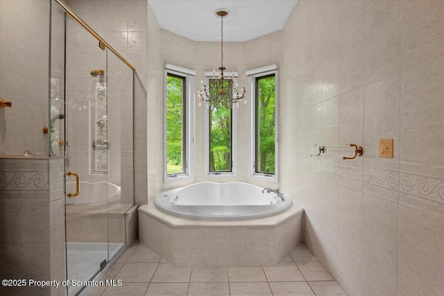 441 Hidden Lake Dr, East Stroudsburg, PA 18302 - full bathroom with a bath, a shower stall, tile patterned flooring, and tile walls