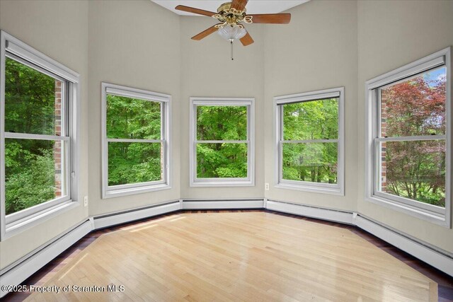 441 Hidden Lake Dr, East Stroudsburg, PA 18302 - unfurnished sunroom featuring a high ceiling, plenty of natural light, and wood finished floors