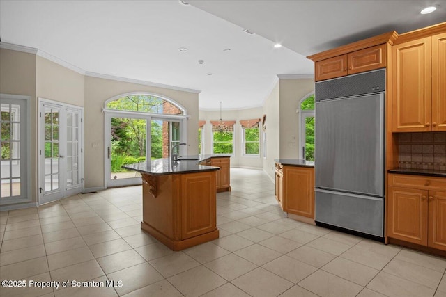 441 Hidden Lake Dr, East Stroudsburg, PA 18302 - kitchen with built in fridge, crown molding, light tile patterned floors, decorative backsplash, and recessed lighting