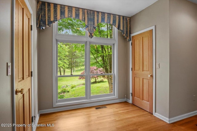 441 Hidden Lake Dr, East Stroudsburg, PA 18302 - unfurnished dining area with baseboards and light wood-type flooring