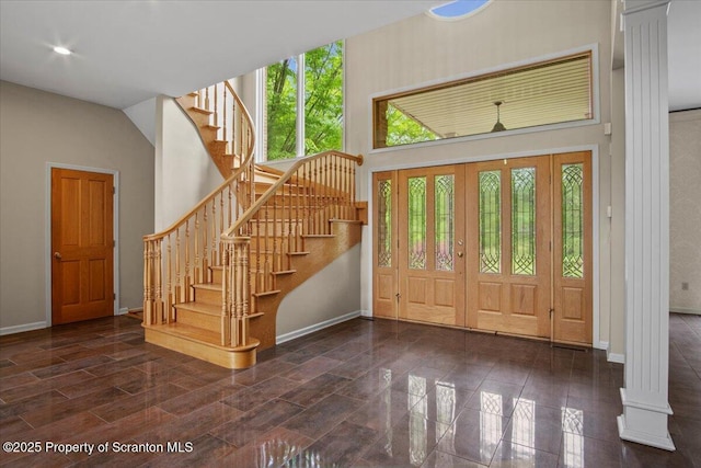 441 Hidden Lake Dr, East Stroudsburg, PA 18302 - entrance foyer featuring stairs, ornate columns, and a towering ceiling