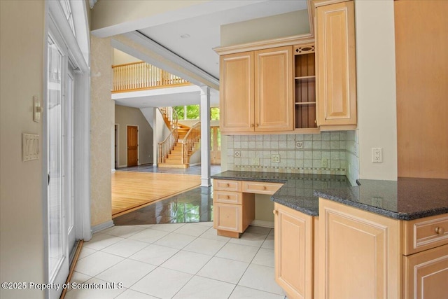 441 Hidden Lake Dr, East Stroudsburg, PA 18302 - kitchen featuring light tile patterned floors, light brown cabinets, decorative backsplash, open shelves, and dark stone counters