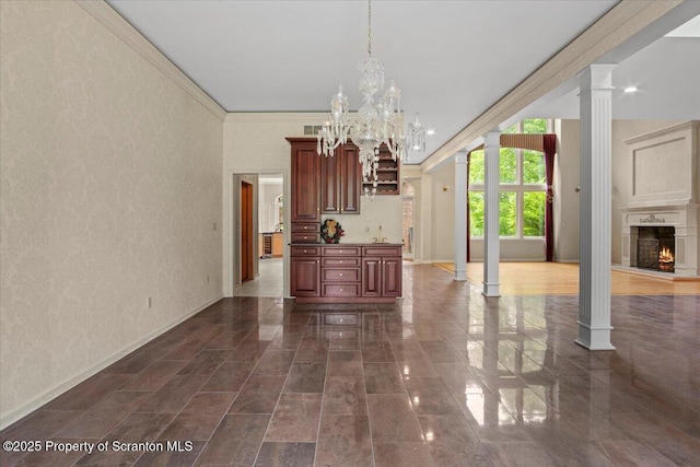 441 Hidden Lake Dr, East Stroudsburg, PA 18302 - living area featuring ornate columns, a chandelier, crown molding, a textured wall, and a lit fireplace