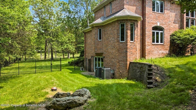 441 Hidden Lake Dr, East Stroudsburg, PA 18302 - view of side of home featuring brick siding and view of scattered trees