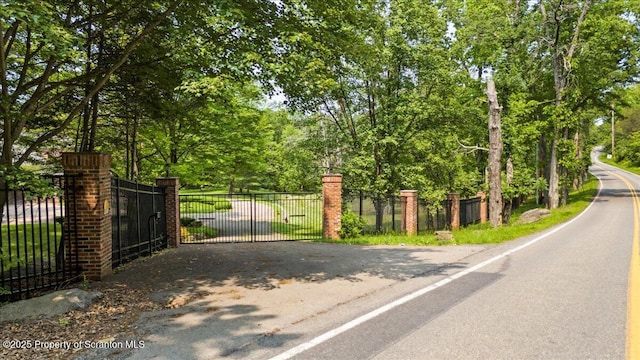 441 Hidden Lake Dr, East Stroudsburg, PA 18302 - gate with view of scattered trees