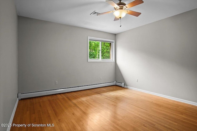 441 Hidden Lake Dr, East Stroudsburg, PA 18302 - empty room featuring a baseboard radiator, light wood-style flooring, and ceiling fan