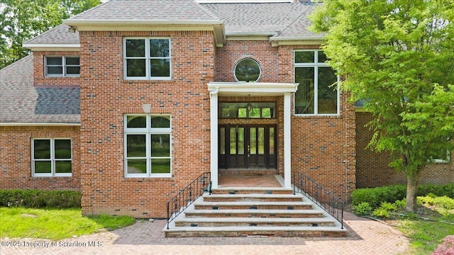 441 Hidden Lake Dr, East Stroudsburg, PA 18302 - doorway to property featuring brick siding and roof with shingles