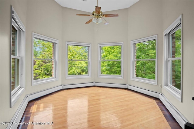 441 Hidden Lake Dr, East Stroudsburg, PA 18302 - unfurnished sunroom with wood finished floors, high vaulted ceiling, plenty of natural light, and baseboard heating