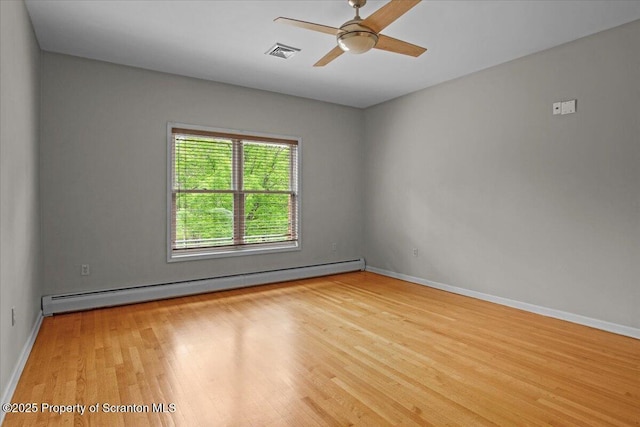 441 Hidden Lake Dr, East Stroudsburg, PA 18302 - unfurnished room featuring a baseboard radiator, wood finished floors, and ceiling fan