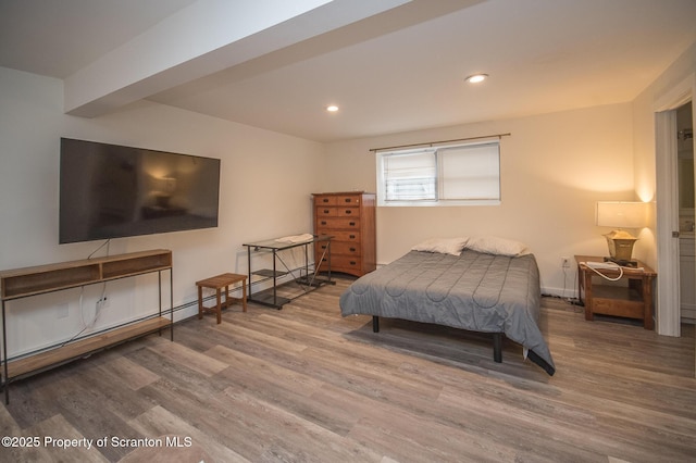 bedroom featuring hardwood / wood-style floors