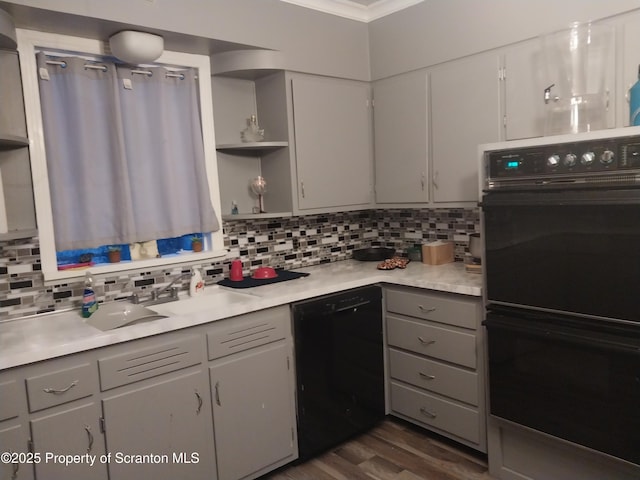 kitchen featuring decorative backsplash, gray cabinetry, black appliances, and open shelves