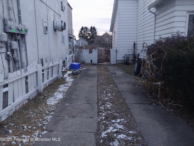 view of property exterior featuring fence