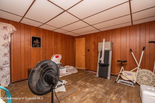 1010 Wood St, Old Forge, PA 18518 - miscellaneous room with hardwood / wood-style flooring, a drop ceiling, and wood walls