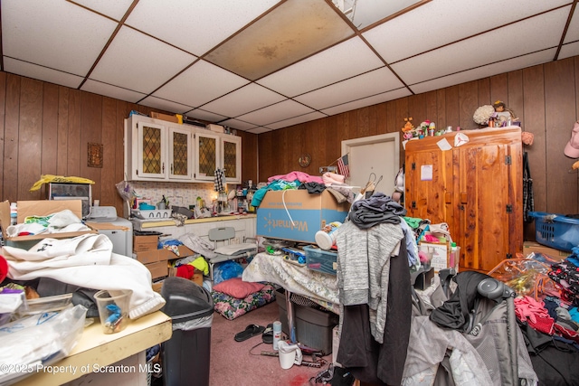1010 Wood St, Old Forge, PA 18518 - misc room with wood walls, carpet flooring, and a paneled ceiling