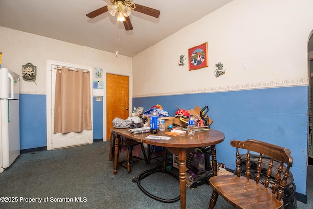 1010 Wood St, Old Forge, PA 18518 - dining room with ceiling fan, wainscoting, and carpet floors