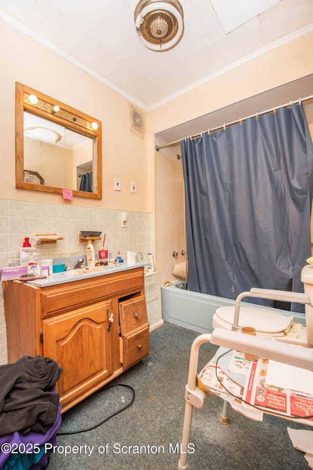 1010 Wood St, Old Forge, PA 18518 - full bathroom featuring vanity, shower / bath combination with curtain, crown molding, and tile walls