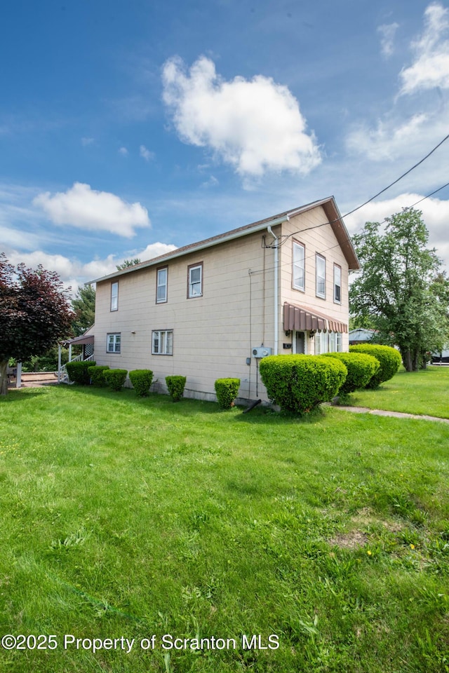 1010 Wood St, Old Forge, PA 18518 - view of side of home with a yard