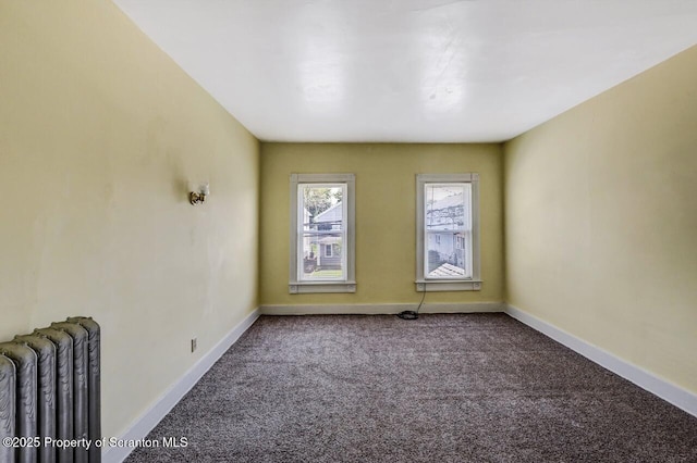 126-128 S Rebecca Ave S, Scranton, PA 18504 - carpeted empty room featuring radiator heating unit and baseboards