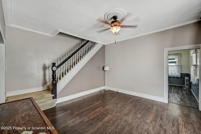 126-128 S Rebecca Ave S, Scranton, PA 18504 - unfurnished living room featuring radiator, crown molding, stairway, wood finished floors, and ceiling fan