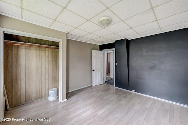 126-128 S Rebecca Ave S, Scranton, PA 18504 - unfurnished bedroom with a paneled ceiling, wood finished floors, a closet, and baseboards