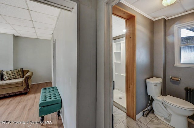126-128 S Rebecca Ave S, Scranton, PA 18504 - full bath with toilet, wood finished floors, a shower stall, crown molding, and baseboards
