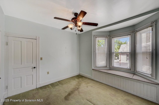 126-128 S Rebecca Ave S, Scranton, PA 18504 - unfurnished room with radiator heating unit, carpet flooring, baseboards, and a ceiling fan