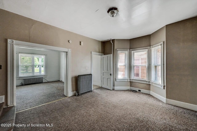 126-128 S Rebecca Ave S, Scranton, PA 18504 - unfurnished bedroom with radiator, carpet flooring, and baseboards